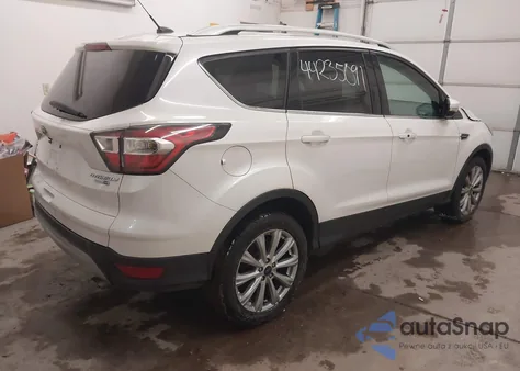 2017 Ford Escape Titanium z USA, uszkodzony, nr VIN 1FMCU9JD2HUB56161